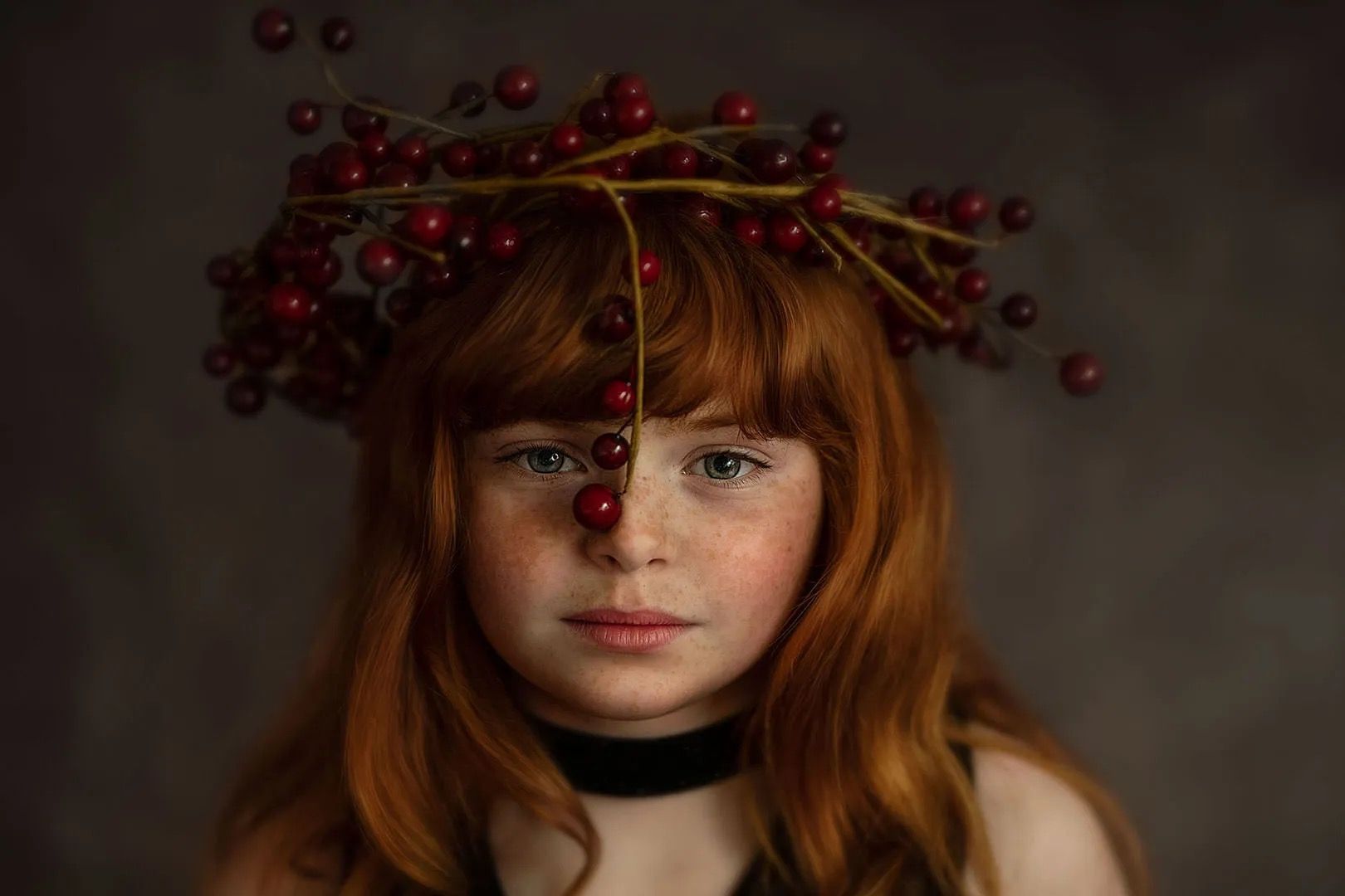 Fine art portrait — girl holding berries