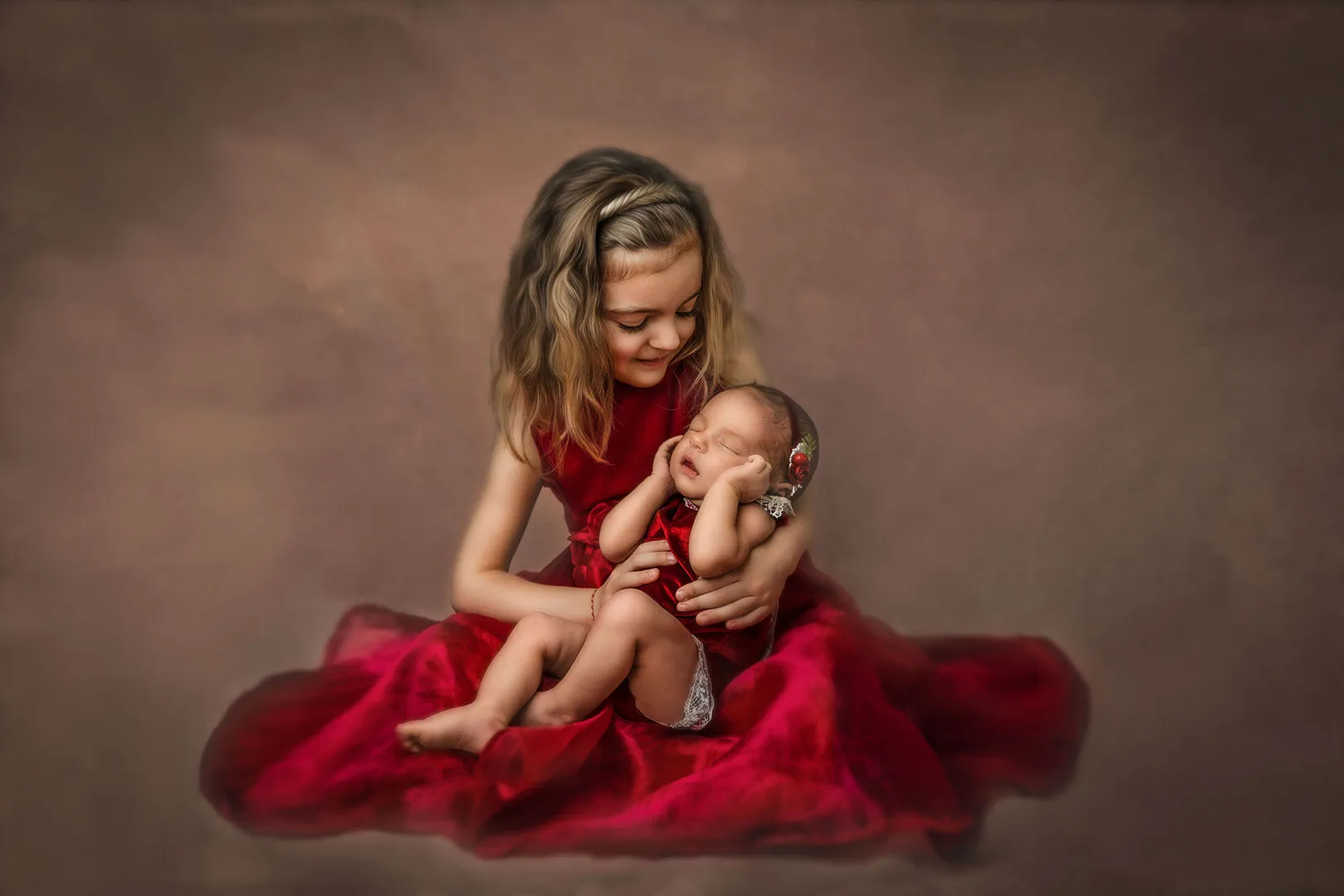 Fine art portrait — sisters in red