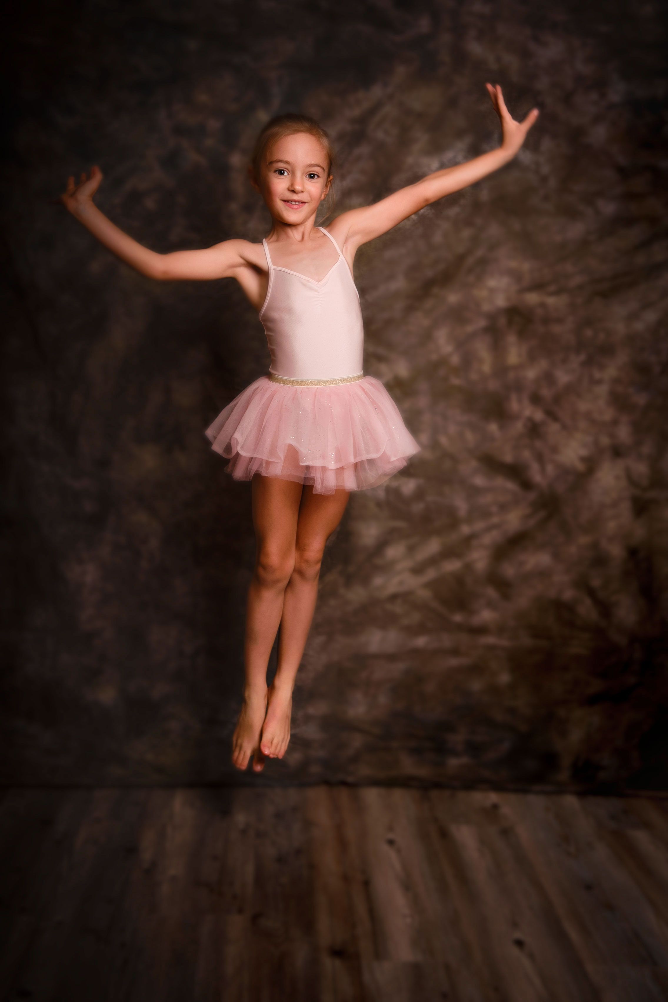 Fine art portrait — ballerina in a pale pink tutu