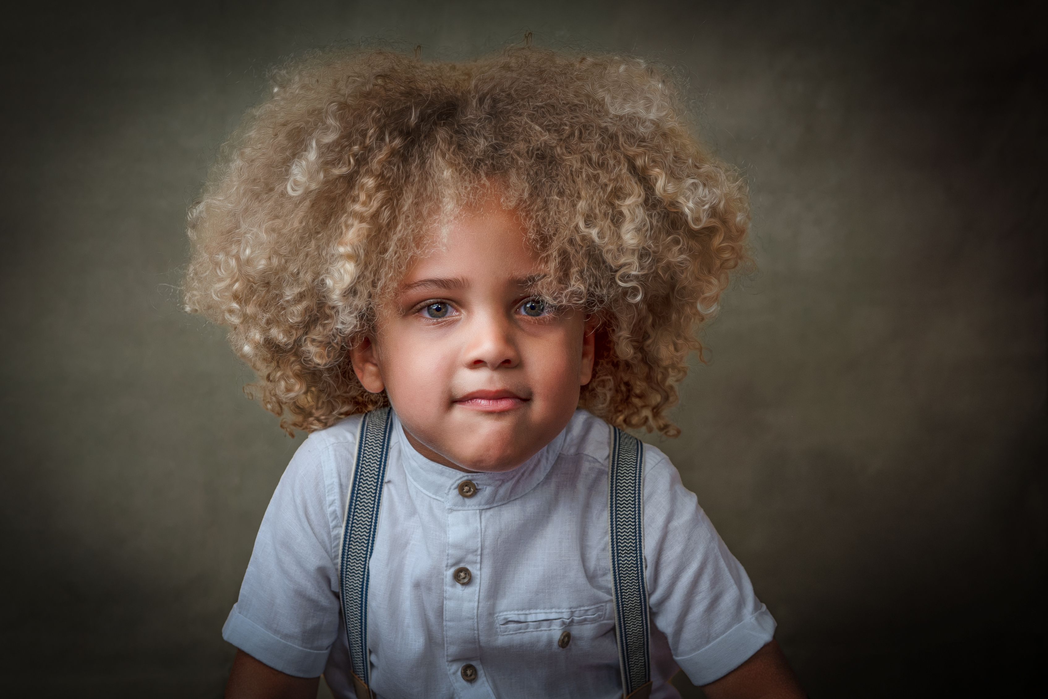 Fine art child portrait — boy with blond curls